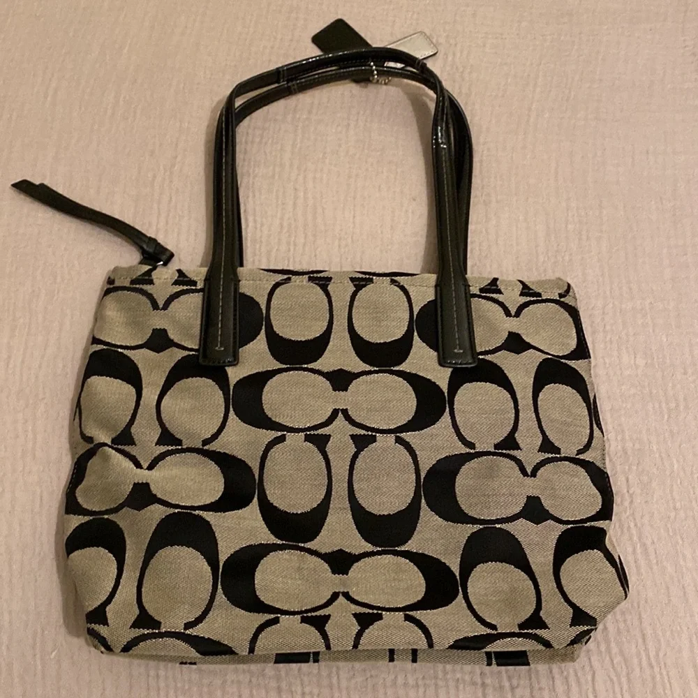 Coach Black and Cream Signature Tote. No. H1380-F25771